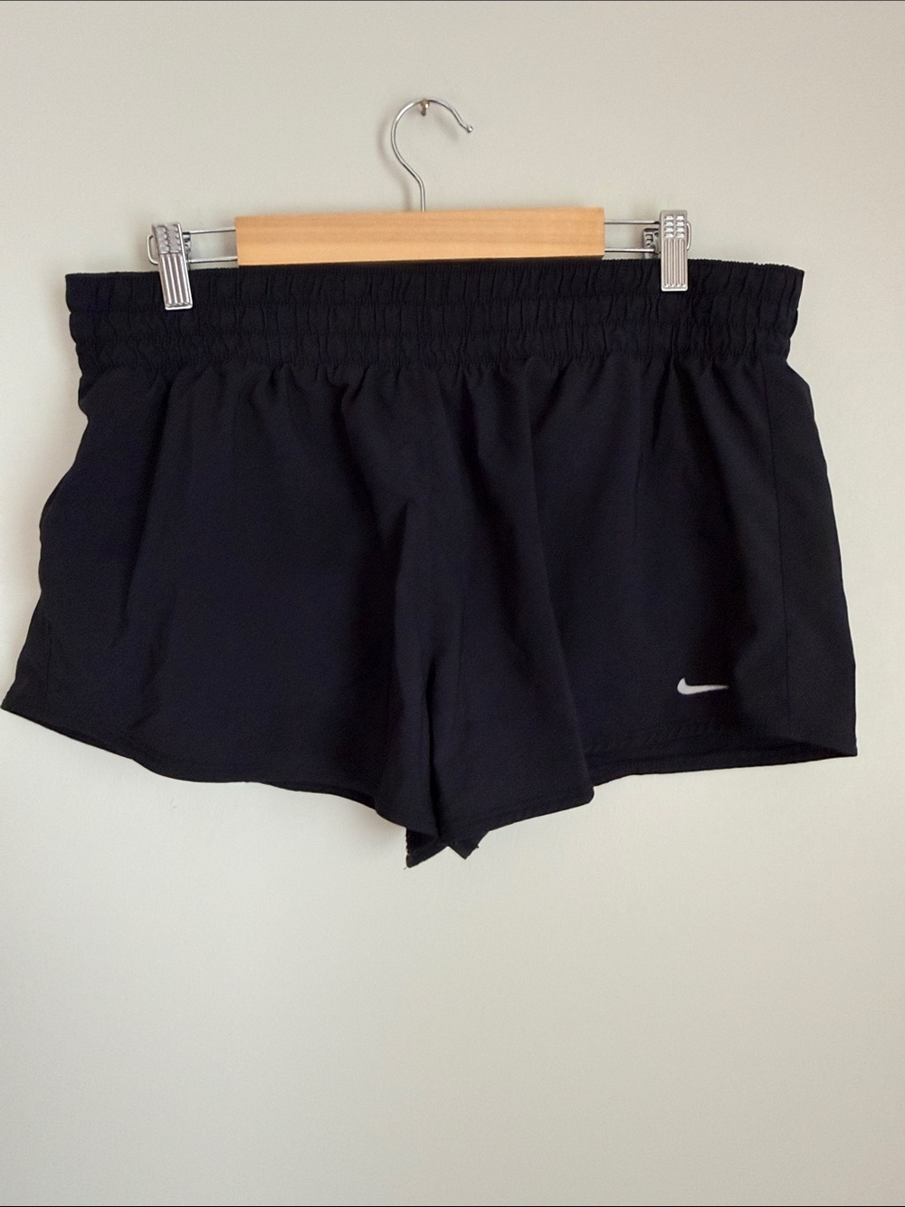 Nike Women’s Black Athletic Shorts with White Swoosh Accent